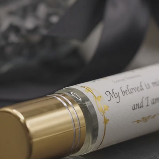 Veiled fragrance roller label close-up