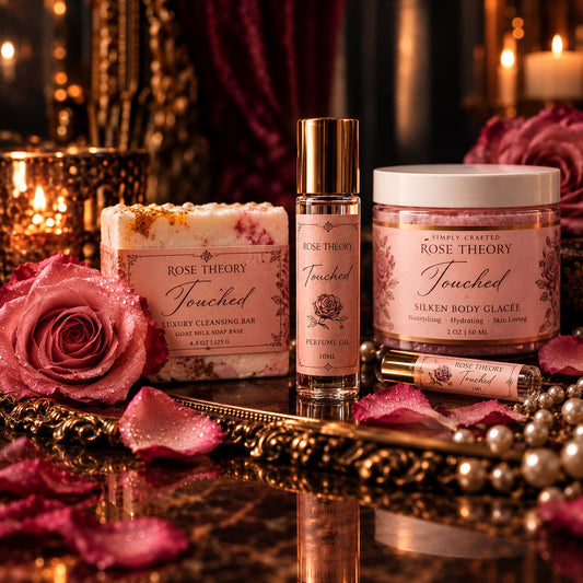 Touched Rose Theory collection with artisan soap, fragrance roller, and Silken Body Glacée in blush and gold styling